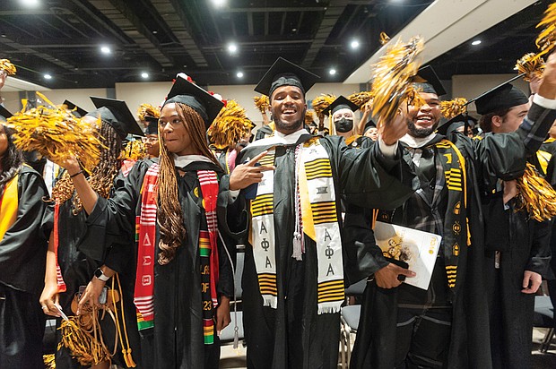 These VCU students could barely contain their excitement during commencement ceremonies on May 13 at the Greater Richmond Convention Center. VCU honored approximately 4,700 spring graduates.