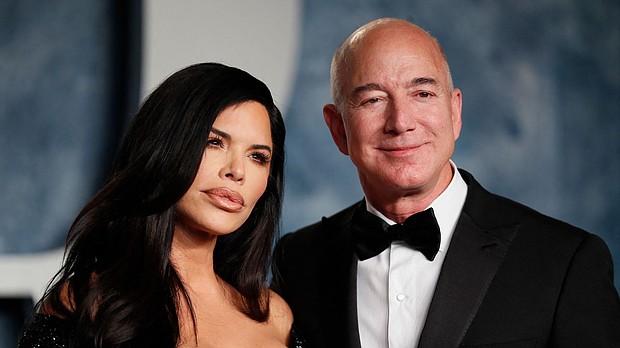 Lauren Sánchez and Jeff Bezos are seen here at the 2023 Vanity Fair Oscar party in Beverly Hills in March. Bezos and Sánchez are engaged, a source close to the couple tells CNN.
Mandatory Credit:	Danny Moloshok/Reuters