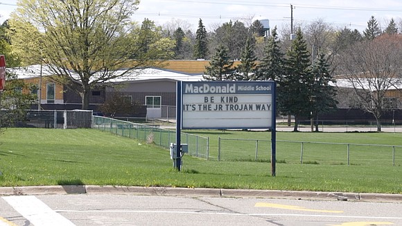 A middle school gym teacher at Macdonald Middle School in East Lansing has been placed on paid administrative leave while …