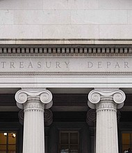 Consumers can take steps to safeguard their finances from some of the effects of the debt ceiling crisis.
Mandatory Credit:	Saul Loeb/AFP/Getty Images