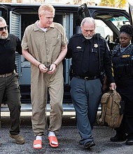 Alex Murdaugh is taken to the Colleton County Courthouse for sentencing March 3 in South Carolina.
Mandatory Credit:	The State/Tribune News Service/Getty Images/File