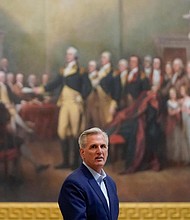 Speaker of the House Kevin McCarthy, R- Calif., walks in the Capitol Rotunda on Capitol Hill in Washington, Sunday, May 21, 2023.