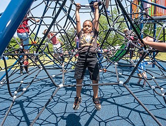 Richmond area youngsters enjoyed the new equipment during a May 20 dedication ceremony for the Markiya Dickson Imagination Zone playground in Fonticello Park. The play area commemorates the life of Markiya who was 9 years-old when she was killed by gunfire that erupted in the park four years ago. Her parents, Ciara Dickson and Mark Whitfield Sr., are pleased with the playground, yet admit that their daughter’s death remains painful. “We’ll never get past it or get over it, so we’re living through it,” said her mother. “We’re learning how to cope with it.”