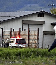 A photo shows a house where a suspect barricaded himself in with a hunting gun in Nakano City on May 25.
Mandatory Credit:	Naoto Suzuki/AP
