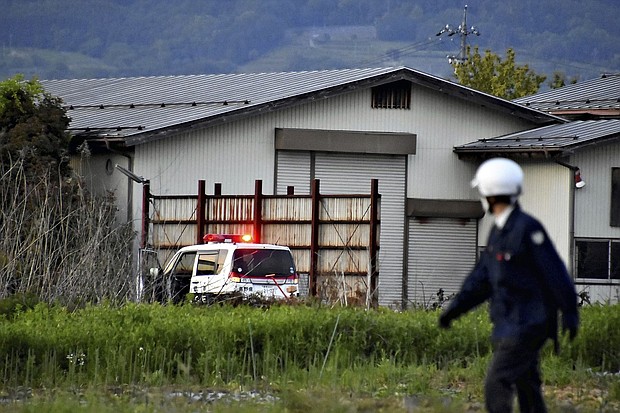 A photo shows a house where a suspect barricaded himself in with a hunting gun in Nakano City on May 25.
Mandatory Credit:	Naoto Suzuki/AP