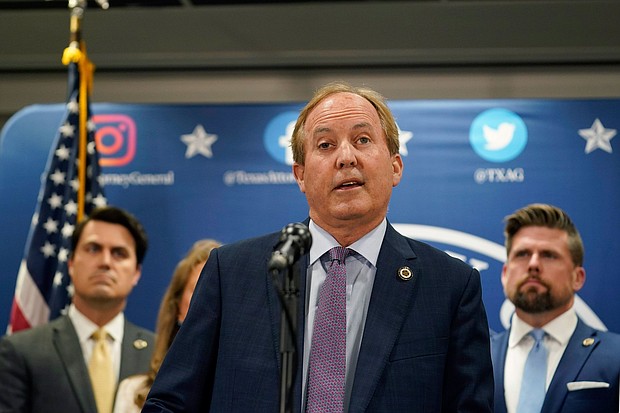 Texas Attorney General Ken Paxton reads a statement at his office in Austin, Texas, on May 26.
Mandatory Credit:	Eric Gay/AP/File