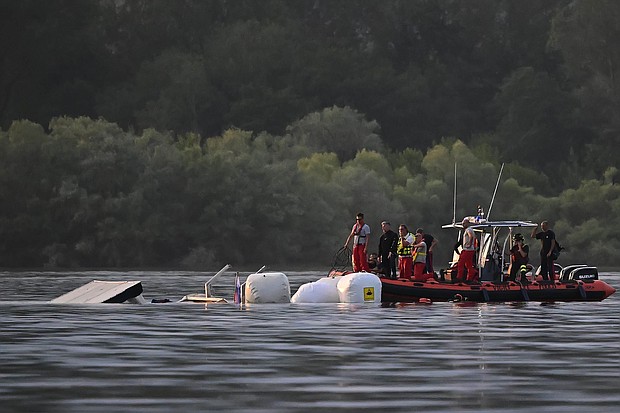 Fire brigade and scuba divers recovered the boat on May 29.
Mandatory Credit:	Mattia Ozbot/Getty Images