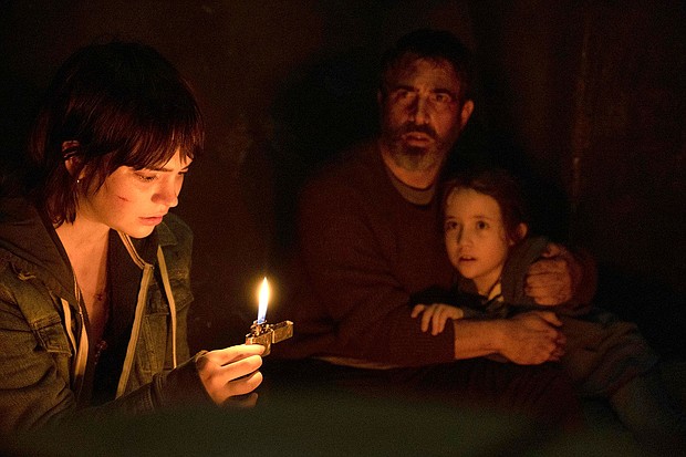 Sophie Thatcher, Chris Messina and Vivien Lyra Blair are pictured here in "The Boogeyman."
Mandatory Credit:	Patti Perret/20th Century Studios