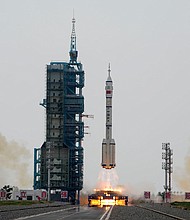A Long March 2F rocket carrying a crew of Chinese astronauts on the Shenzhou-16 spaceship lifts off at the Jiuquan Satellite Launch Center in northwestern China on May 30.
Mandatory Credit:	Mark Schiefelbein/AP