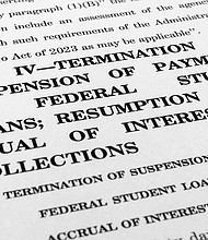 The draft of a bill that President Joe Biden and House Speaker Kevin McCarthy negotiated to raise the nation's debt ceiling is photographed on May 29.
Mandatory Credit:	Jon Elswick/AP