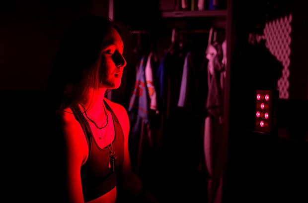 Kelsie Whitmore of the Staten Island FerryHawks baseball team uses red light therapy in her locker room on September 8, 2022.
Mandatory Credit:	Al Bello/Getty Images
