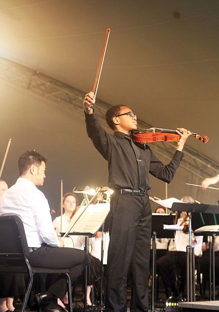 Conducted by Chia-Hsuan Lin, the concert featured soloists Katerina Burton, a Maryland resident, and Isaac Wilson, left, a violinist in the symphony’s youth orchestra who received a standing ovation. The event was presented through a partnership between the symphony and the Black History Museum & Cultural Center of Virginia.