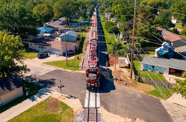Officials are putting millions of dollars into fixing dangerous intersections where trains and cars meet. Pictured is a freight train at a railroad crossing in Camanche, Iowa, in 2022.
Mandatory Credit:	Tammy Ljungblad/Kansas City Star/Tribune News Service/Getty Images