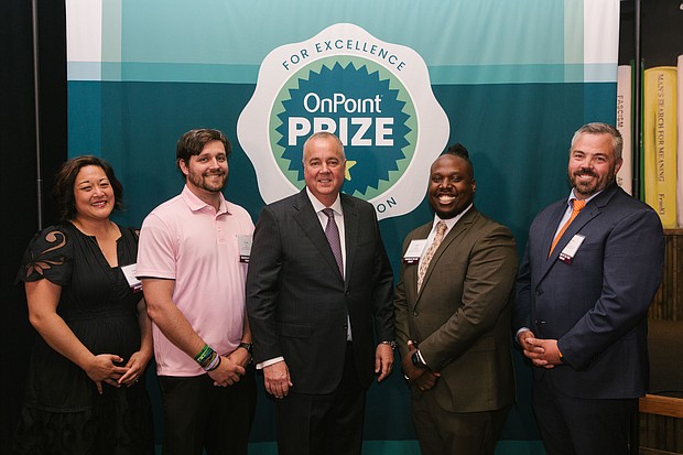 From left to right: Caryn Anderson, K-5 Educator of the Year winner; Lucas Dix, 6-8 Educator of the Year winner; Rob Stuart, President & CEO, OnPoint Community Credit Union; Willie Williams, 9-12 Educator of the Year winner; Samuel Platt, Gold Star Educator of the Year winner.