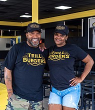 Bun B and wife Queenie Freeman inside Trill Burgers