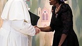 Pope Francis greets Agnes Regina Murei Abuom, moderator of the Central Committee of the World Council of Churches, upon his arrival in June 2018 at the Visser’t Hall at an ecumenical center in Geneva, Switzerland.