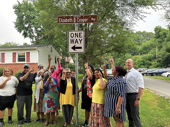 Several family members, neighbors and friends gathered yesterday for an honorary street renaming of the 5300 block of Marian Street ...