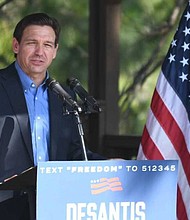 Florida Gov. Ron DeSantis speaks outside Okatie Ale