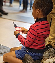 A youngster shows his patriotism during 67th Commonwealth’s Annual Memorial Day Ceremony at the Virginia War Memorial, 621 S. Belvidere St. in Richmond.