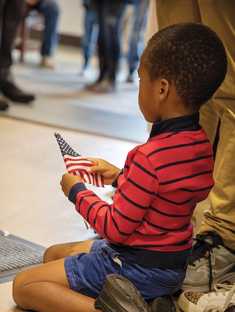 A youngster shows his patriotism during 67th Commonwealth’s Annual Memorial Day Ceremony at the Virginia War Memorial, 621 S. Belvidere St. in Richmond.