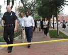 Acting Police Chief Rick Edwards leads the way with other city officials, including Richmond Mayor Levar M. Stoney, City Council President Michael Jones, to brief members of the media following an afternoon shooting after Hugeunot High School commencement inside Altria Theater that left two people dead, including a graduate and a relative outside the building Tuesday.