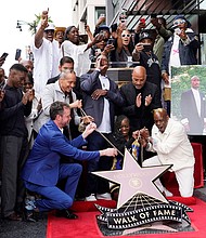 Fans, friends and family of the late rapper/actor Tupac Shakur reveal his new star on June 7.
Mandatory Credit:	Chris Pizzello/Invision/AP