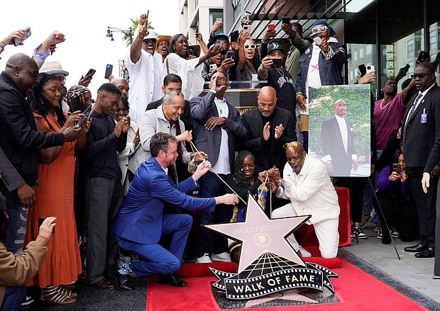 Fans, friends and family of the late rapper/actor Tupac Shakur reveal his new star on June 7.
Mandatory Credit:	Chris Pizzello/Invision/AP
