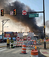 Officials work at the scene after a section of I-95 collapsed on Sunday.
Mandatory Credit:	Philadelphia Fire Department/AP