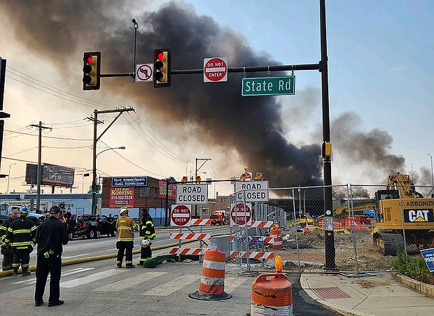 Officials work at the scene after a section of I-95 collapsed on Sunday.
Mandatory Credit:	Philadelphia Fire Department/AP
