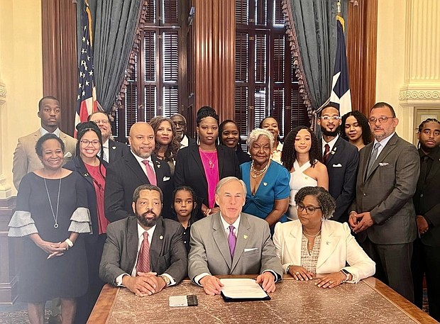 Rep. Borris L. Morris, Gov. Greg Abbott, Rep. Rhetta Andrews Bowers, and other legislators jpg