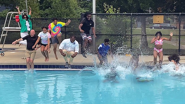 A fully clothed Mayor Levar M. Stoney does a cannonball with several youngsters in tow, while 3rd District City Councilwoman Ann-Frances Lambert cheers them on during Battery Park’s 3rd Annual Splash Day celebration Friday, June 9.
Along with Richmond Parks and Recreation Director Chris Frelke, far left, city officials’ pool moves helped inform the public that Richmond’s swimming pools are officially open for business. Summer camps also are enrolling happy campers and late-night gym access began June 9.
Area pools include:
•Randolph Pool: 1507 Grayland Ave., (804) 646-1329. 
•Swansboro Pool: 3160 Midlothian Turnpike, (804) 646-8088. 
•Blackwell Pool: E. 16th St & Everett St., (804) 646-8718.
•Fairmount Pool: 2000 U. St., (804) 646-3831. 
•Bellemeade Pool: 1800 Lynhaven Ave., (804) 646-8849. 
•Powhatan Pool: Powhatan Community Center, 5051 Northampton St., (804) 646-3595.
•Battery Park Pool: 2719 Dupont Circle, (804) 646-0127. 
•Hotchkiss Field Pool: 701 E. Brookland Park Blvd., (804) 646-3762.
•Woodville Pool: 2305 Fairfield Ave., (804) 646-3834.