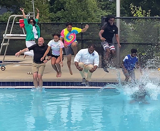 A fully clothed Mayor Levar M. Stoney does a cannonball with several youngsters in tow, while 3rd District City Councilwoman Ann-Frances Lambert cheers them on during Battery Park’s 3rd Annual Splash Day celebration Friday, June 9.
Along with Richmond Parks and Recreation Director Chris Frelke, far left, city officials’ pool moves helped inform the public that Richmond’s swimming pools are officially open for business. Summer camps also are enrolling happy campers and late-night gym access began June 9.
Area pools include:
•Randolph Pool: 1507 Grayland Ave., (804) 646-1329. 
•Swansboro Pool: 3160 Midlothian Turnpike, (804) 646-8088. 
•Blackwell Pool: E. 16th St & Everett St., (804) 646-8718.
•Fairmount Pool: 2000 U. St., (804) 646-3831. 
•Bellemeade Pool: 1800 Lynhaven Ave., (804) 646-8849. 
•Powhatan Pool: Powhatan Community Center, 5051 Northampton St., (804) 646-3595.
•Battery Park Pool: 2719 Dupont Circle, (804) 646-0127. 
•Hotchkiss Field Pool: 701 E. Brookland Park Blvd., (804) 646-3762.
•Woodville Pool: 2305 Fairfield Ave., (804) 646-3834.