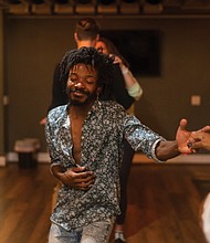 Mentor artist Joshua Purnell, center, and apprentice Tom Norris dance with partners during a social dance at the Fred Huette Center in Norfolk.