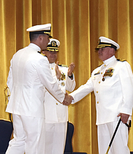 Photo By Selena Brock | 230616-N-IW561-0033 KITTERY, Maine (June 16, 2023) – Cmdr. Robert Lane, right, outgoing commanding officer of the USS Greeneville (SSN 772), shakes hands with his relief Cmdr. Chad Tella during a change-of-command ceremony at Portsmouth Naval Shipyard (PNSY) in Kittery, Maine, June 16. Capt. Daniel Reiss, center, commander of Submarine Squadron (SUBRON) TWO, presided over the ceremony. SUBRON Two provides administrative, logistical, and operational support for fast-attack submarines homeported at PNSY during periods of maintenance and improvement. (U.S. Navy photo by Selena Brock)