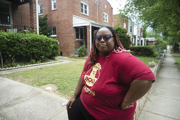 Makia Green stands outside her Washington home on June 12. As a Black student who was raised by a single mother, Ms. Green believes she benefited from a program that gave preference to students of color from economically disadvantaged backgrounds when she was admitted over a decade ago to the University of Rochester. As a borrower who still owes just more than $20,000 on her undergraduate student loans, she has been counting on President Biden’s promised debt relief to wipe nearly all that away. Now, both affirmative action and the student loan cancellation plan — policies that disproportionately help Black students — could soon be dismantled by the U.S. Supreme Court.
