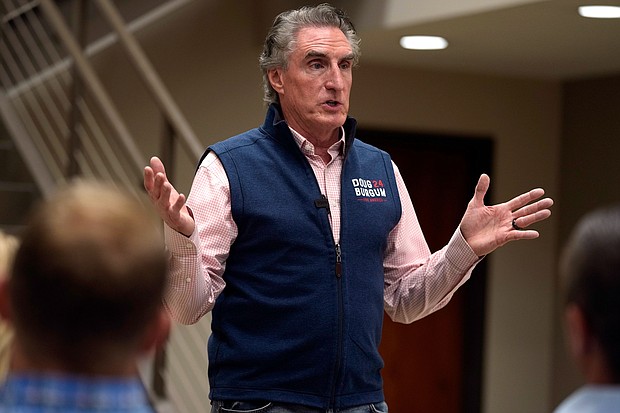 Republican presidential candidate North Dakota Gov. Doug Burgum speaks during a town hall meeting on June 9 in Elkhart, Iowa. Burgum on June 25 sought to assuage concerns of an overcrowded 2024 primary field.
Mandatory Credit:	Charlie Neibergall/AP