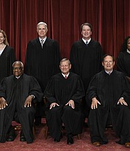 Justices of the US Supreme Court pose for their official photo at the Supreme Court in Washington, DC on October 7, 2022.
Mandatory Credit:	Olivier Douliery/AFP/Getty Images