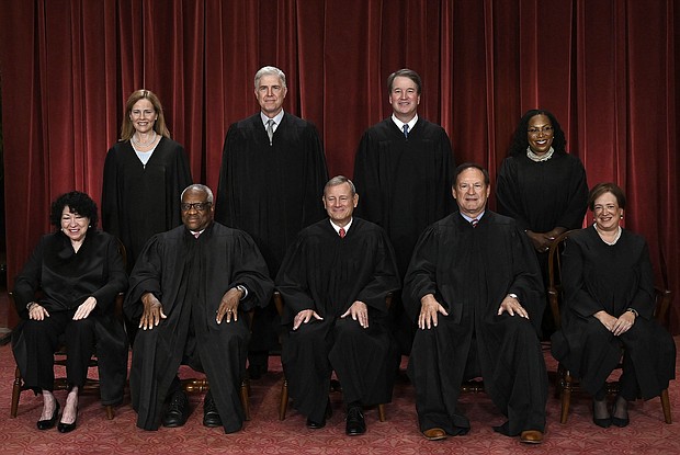 Justices of the US Supreme Court pose for their official photo at the Supreme Court in Washington, DC on October 7, 2022.
Mandatory Credit:	Olivier Douliery/AFP/Getty Images