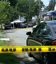 Police are seen at the location of an apparent triple homicide in Newton, Massachusetts, on Sunday.
Mandatory Credit:	WCVB