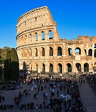 People gathered at the Colosseum in Rome on April 7, prior to the Way of the Cross (Via Crucis) prayer service as part of Holy Week celebrations.
Mandatory Credit:	Andreas Solaro/AFP/Getty Images