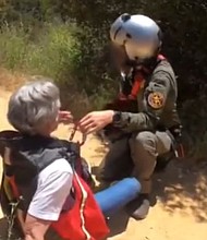An avid hiker was able to use her iPhone SOS feature to alert rescue crews after getting injured on Trail Canyon Falls.
Mandatory Credit:	Ventura Co Fire/KCAL