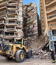 Three victims of the collapse have been identified.
Mandatory Credit:	Mohamed Ahmed/Xinhua/Getty Images
