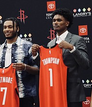 Houston Rockets Coach Ime Udoka and General Manager Rafael Stone with new players Amen Thompson and Cam Whitmore