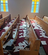Pages that were torn from Bibles and hymnals litter the pews and sanctuary at Fowler United Methodist Church in Annapolis, Md, on June 9, 2023.