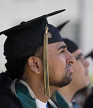 Incarcerated graduate Gerald Massey listens to a speech during his graduation ceremony at Folsom State Prison in Folsom, Calif., Thursday, May 25.