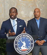 Mayor Levar M. Stoney announces new partners for the Health Equity Fund during a meeting at City Hall on Tuesday. He was joined by City Council President Michael Jones.