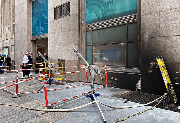 A smoke damaged Tiffany & Co. store on Fifth Avenue in New York on Thursday, June 29. Smoke that billowed outside Tiffany's New York flagship location on Thursday morning was from a transformer that caught fire underneath the sidewalk, according to the city's fire department.
Mandatory Credit:	Jeenah Moon/Bloomberg/Getty Images