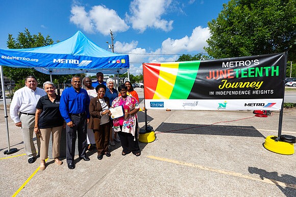 U.S. Rep. Sheila Jackson Lee presents a proclamation at the ribbon cutting event.