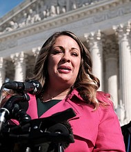 Lorie Smith, a web designer from Colorado, speaks to reporters outside after the Supreme Court heard arguments in her First Amendment battle pitting claims of religious freedom against laws prohibiting discrimination on the basis of sexual orientation in Washington, DC, on December 5, 2022.
Mandatory Credit:	Michael A. McCoy/The New York Times/Redux