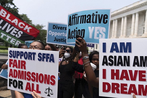 People demonstrate June 29 outside the Supreme Court in Washington after the high court struck down affirmative action in college admissions, saying race cannot be a factor.